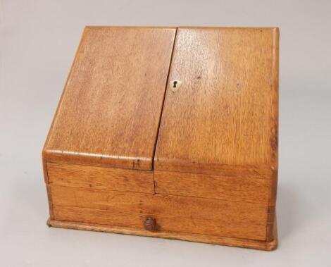 An Edwardian oak stationery box