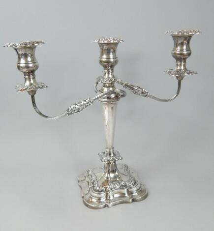 An Elizabeth II three branch silver candelabra