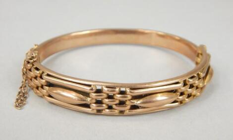 A 9ct gold bangle