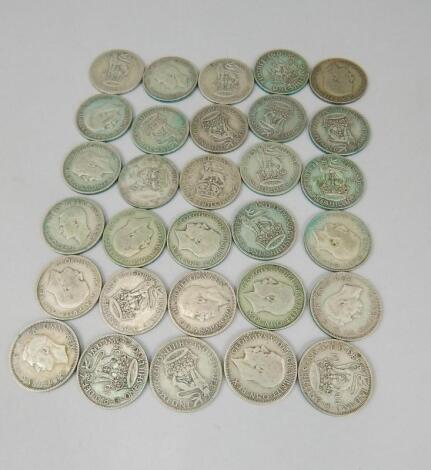 Thirty pre-1946 one shilling coins.