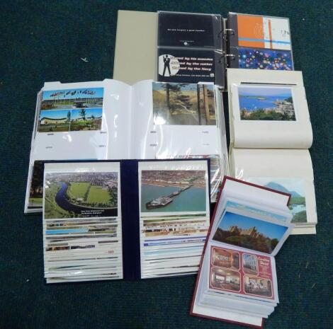 A large quantity of coloured postcards etc.