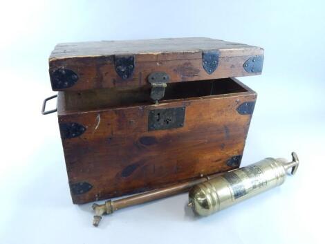 A Victorian pine and ebonised metal small trunk