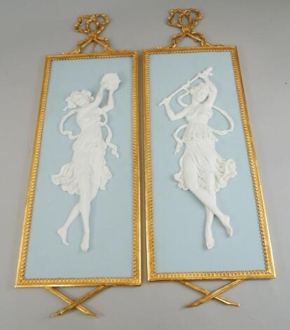 An unusual pair of Jasperware type wall plaques