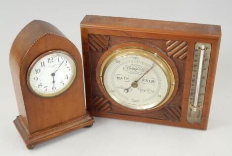 A rectangular barometer and thermometer