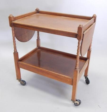 A 20thC mahogany drop leaf two tier trolley