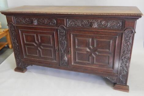 A late Victorian oak sideboard