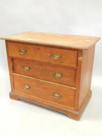 A Victorian walnut chest of three long drawers