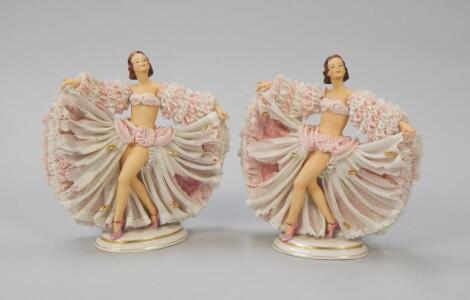 A pair of Dresden porcelain crinoline figures