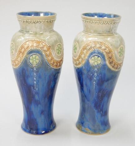 A pair of Royal Doulton stoneware vases