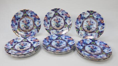 A set of twelve 19thC ironstone type dessert plates