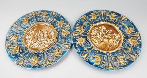 A pair of Austrian majolica coloured plaques