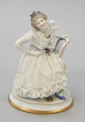 A Dresden porcelain crinoline lady