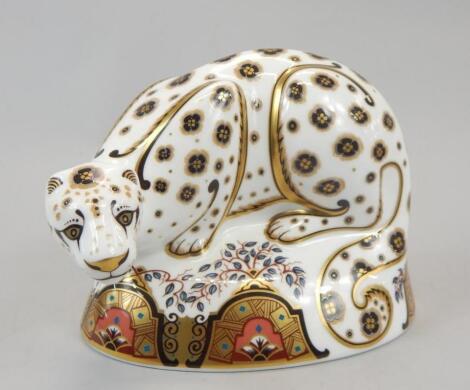 A Royal Crown Derby porcelain snow leopard paperweight