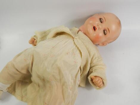 An early 20thC Armand Marseille bisque headed baby doll