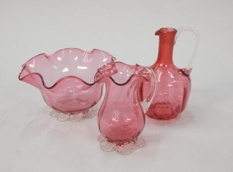 Three items of cranberry tinted glass