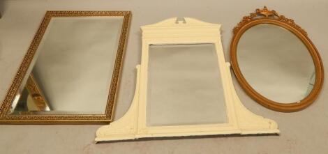 A gilt gesso oval wall mirror