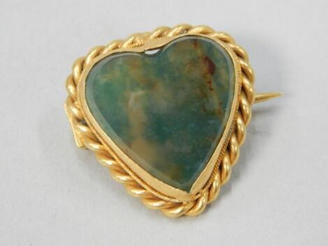 A heart shaped brooch