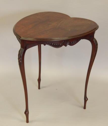 An Edwardian mahogany occasional table