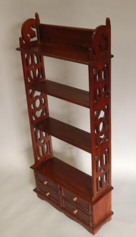 A reproduction hardwood wall shelf