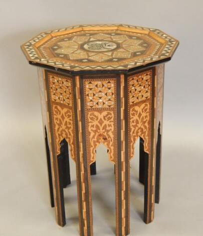 A late 19thC/early 20thC Middle Eastern hardwood occasional table