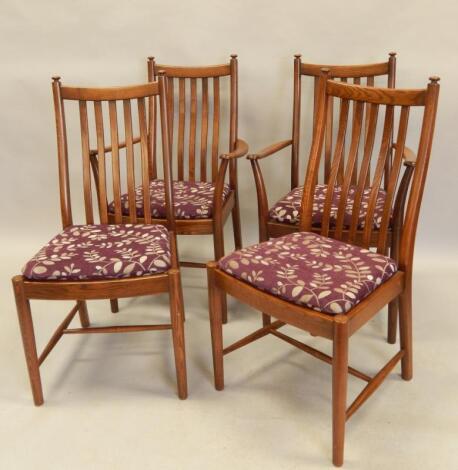 A set of four Ercol elm slat back dining chairs