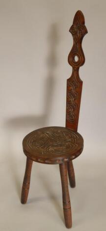 A 20thC carved hall chair