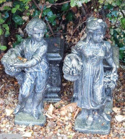 A pair of modern garden ornaments