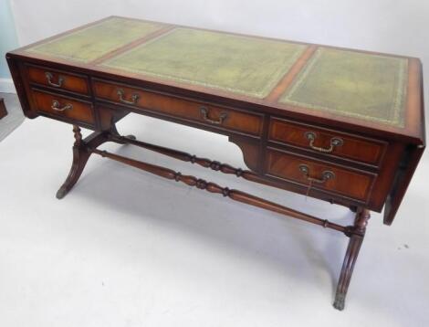 A large reproduction mahogany desk