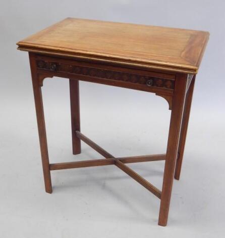 An Edwardian mahogany card table