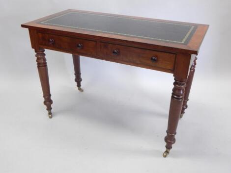 A Victorian mahogany writing table