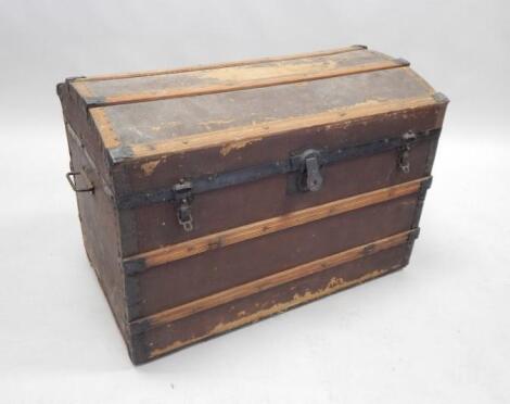 A late 19th/early 20thC canvas and wooden bound trunk