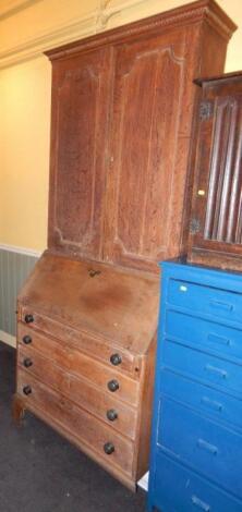 An oak bureau bookcase