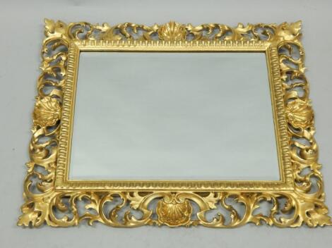 A late 19thC / early 20thC Florentine gilt wood wall mirror