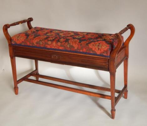 A late 19thC / early 20thC walnut duet piano stool