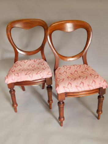 A pair of Victorian mahogany balloon back dining chairs