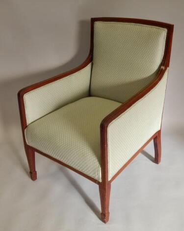 An Edwardian mahogany boxwood and ebony strung armchair