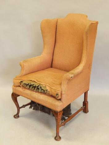 A 19thC oak wingback chair