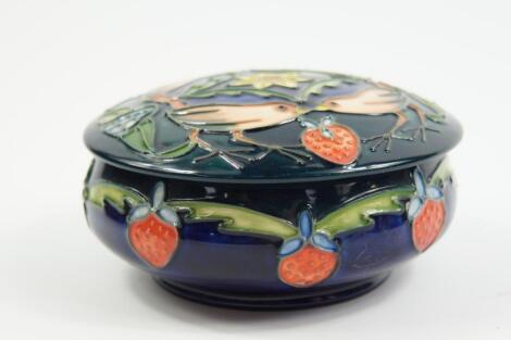 A Moorcroft Pottery powder box and cover decorated in The Strawberry Thief pattern