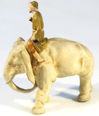 A 19thC bisque porcelain figure of a gentleman riding an elephant - 2