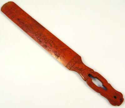 A Chinese carved bamboo page turner