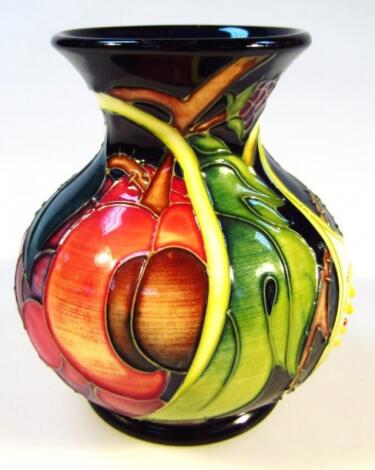 A modern Moorcroft Queen's Choice pattern vase