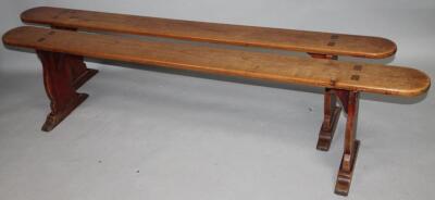 A near matching pair of 19thC polished elm benches