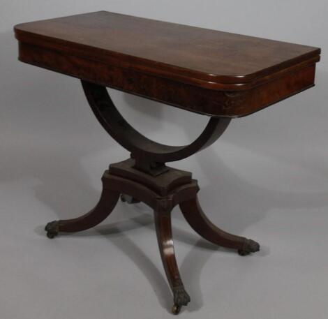 A mid-19thC mahogany fold over tea table