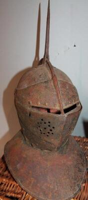 Various armour, to include helmets, gauntlet guards, etc., contained in a F & M wicker hamper (a quantity) - 3