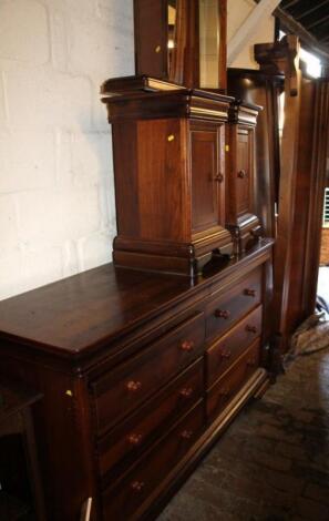 A 20thC polished bedroom suite