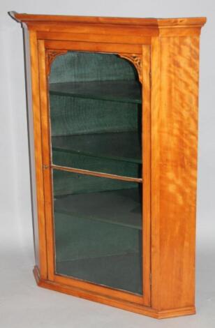 A 19thC satinwood hanging corner cabinet