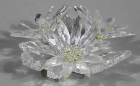 A Swarovski crystal three headed flower ornament