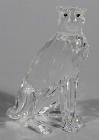 A Swarovski crystal figure of a seated wild cat
