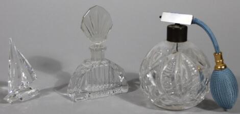 A cut glass perfume atomizer