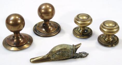 An early 20thC brass duckhead paper clip